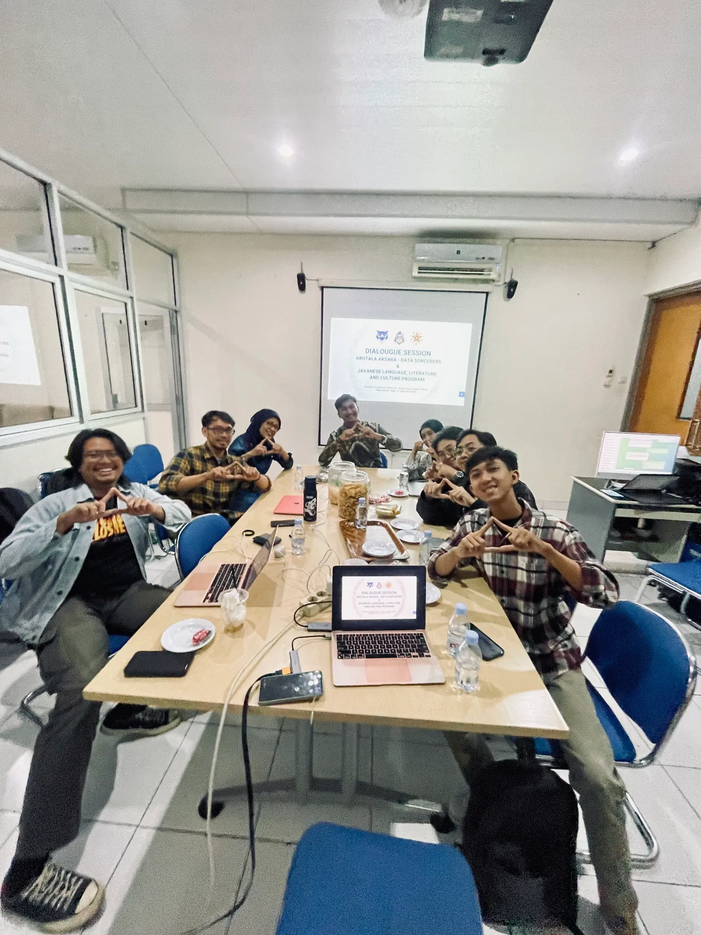 Participants pose together after the Arutala Aksara and UGM dialogue